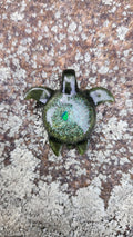 Cosmic sea turtle pendant with green opal